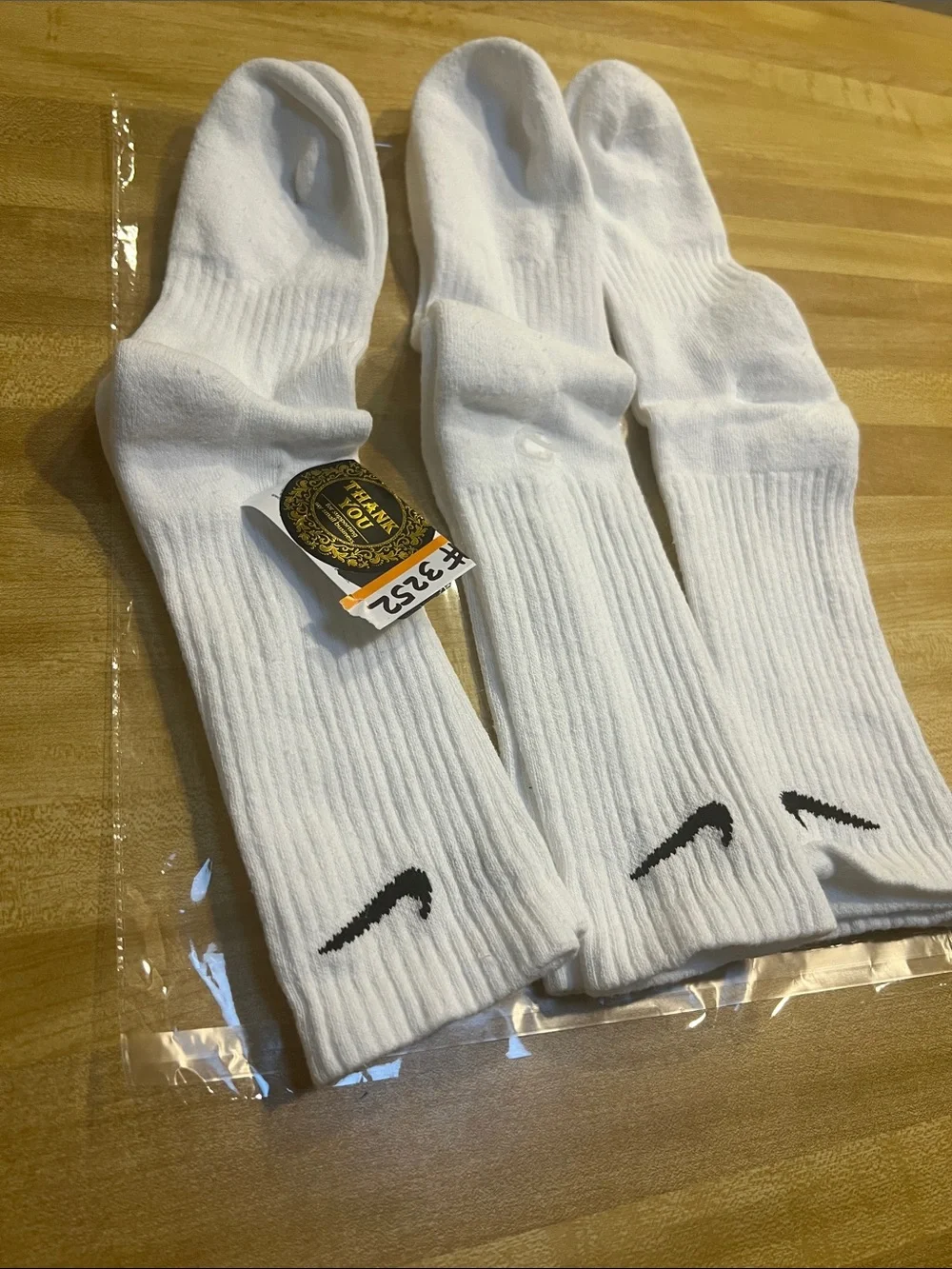 #3252**Nike White Crew Socks with Black Swoosh - Triple Pack